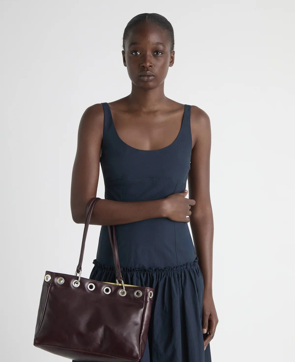 Minimalist Metal Eyelet Shoulder Bag