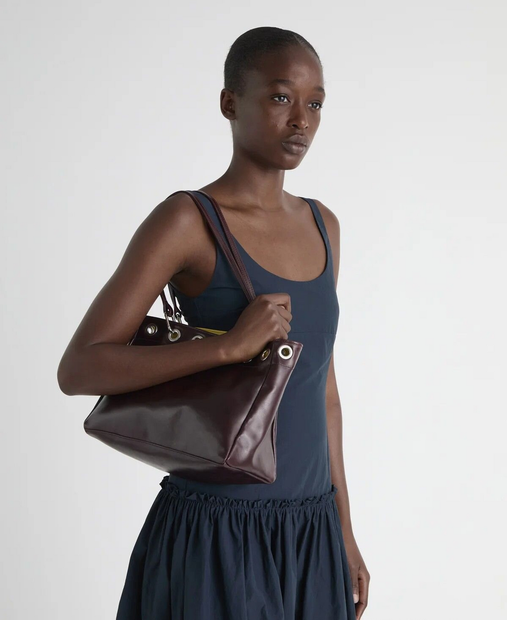 Minimalist Metal Eyelet Shoulder Bag